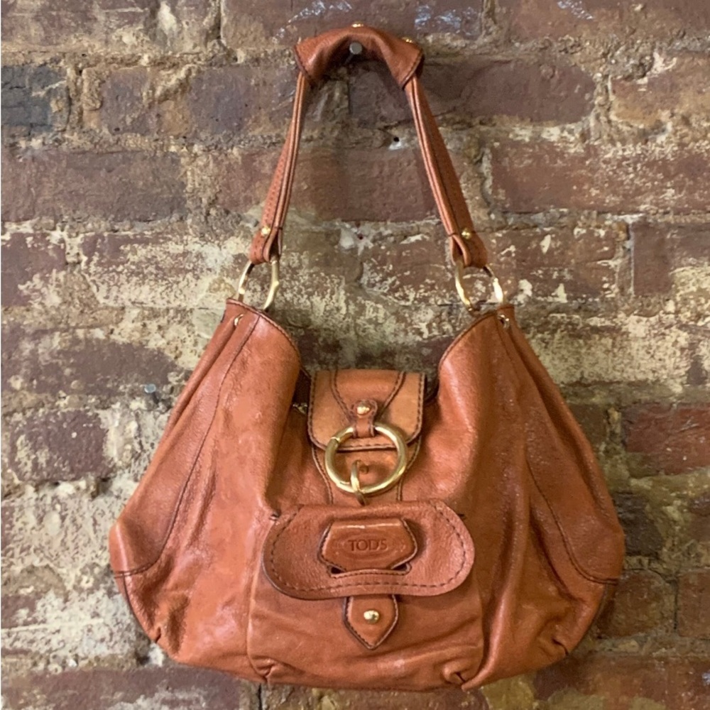 Vintage Tod’s caramel brown colored leather shoulder bag medium size